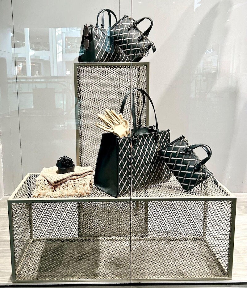 Window riser with handbags and gloves